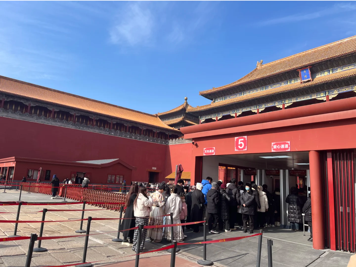 Visitors queuing at the Meridian Gate entrance of the Forbidden City