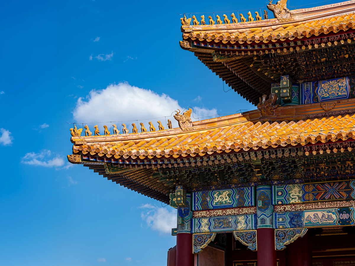 Glazed roof tiles and bracket details of a Forbidden City building