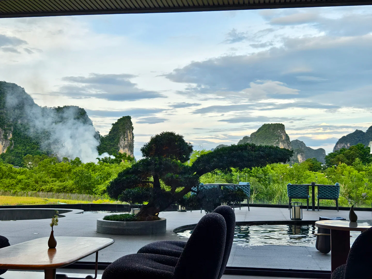 Yangshuo hotel seating with karst mountain view
