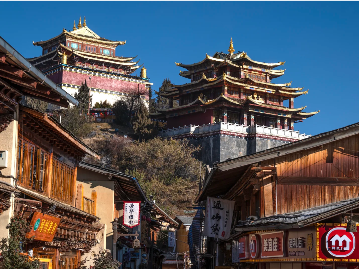 Tibetan-style wooden buildings on a street in Dukezong Ancient Town