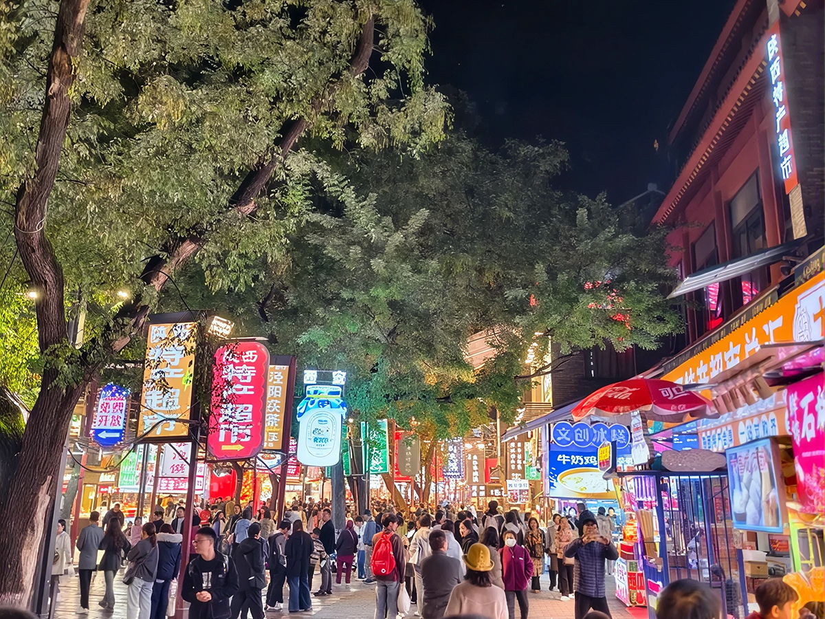 Xi'an Muslim Quarter street food stalls at night