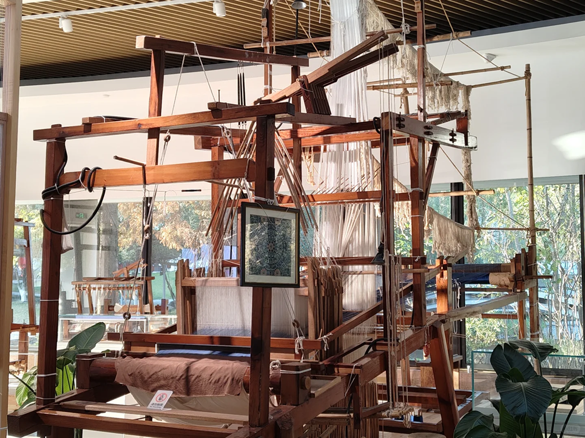 Traditional wooden Chinese weaving loom in a museum