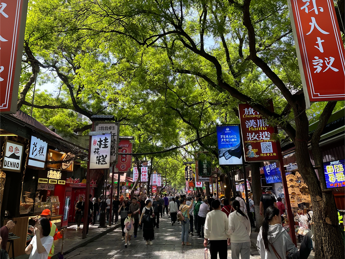 Busy Huimin Street with shops and visitors in Xi'an