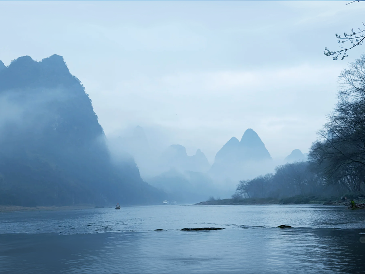 Misty Li River with karst peaks