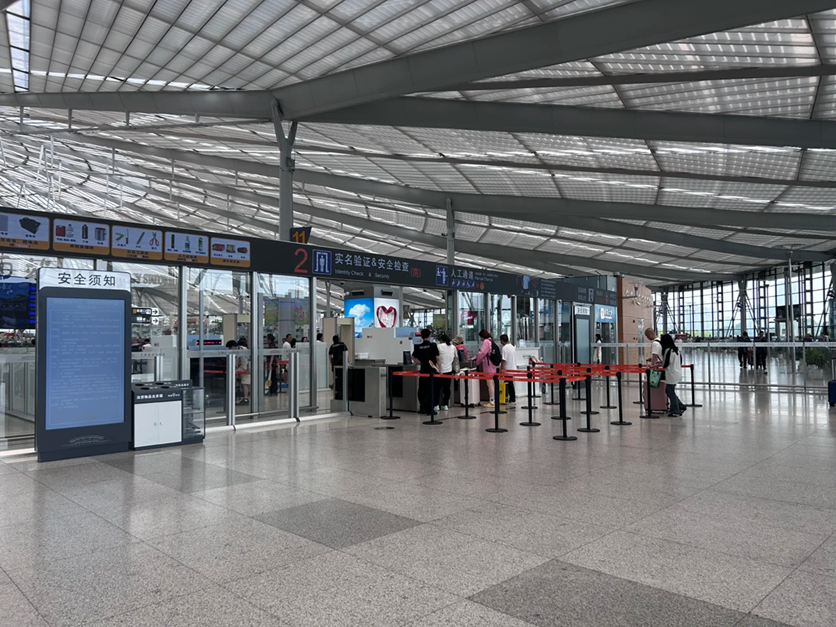 Manual passport verification channel at a high-speed railway station