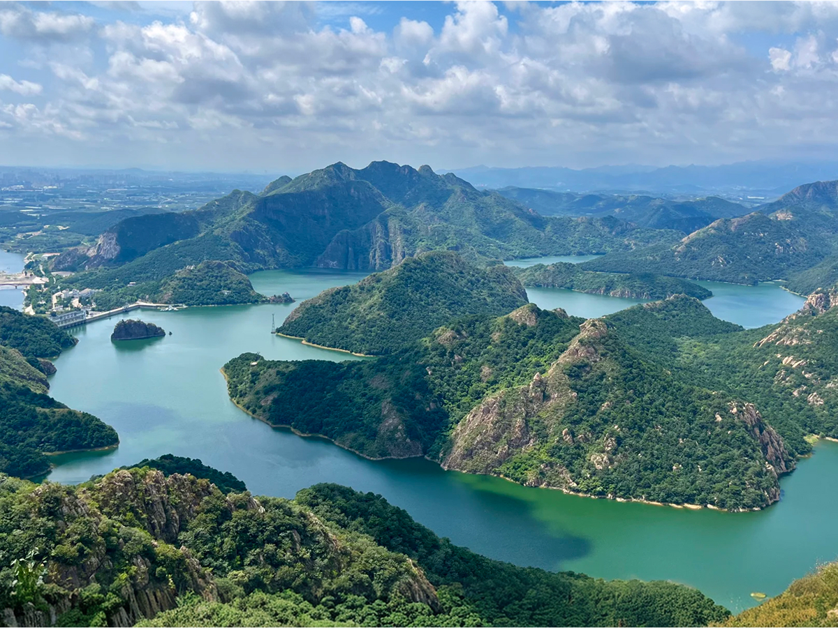 Reservoir and mountains in spring