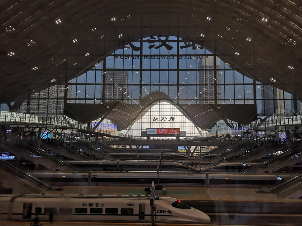 High speed trains waiting to depart can be seen in the waiting hall of Wuhan Railway Station
