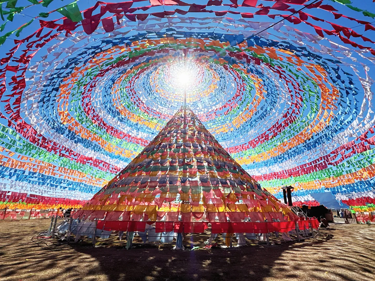 Tibetan stupa with colorful prayer flags in Shangri-La