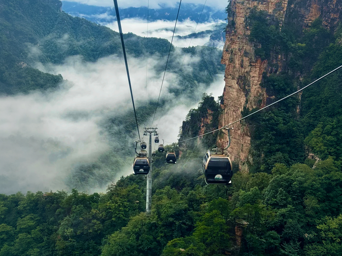 Cable car above clouds in Zhangjiajie