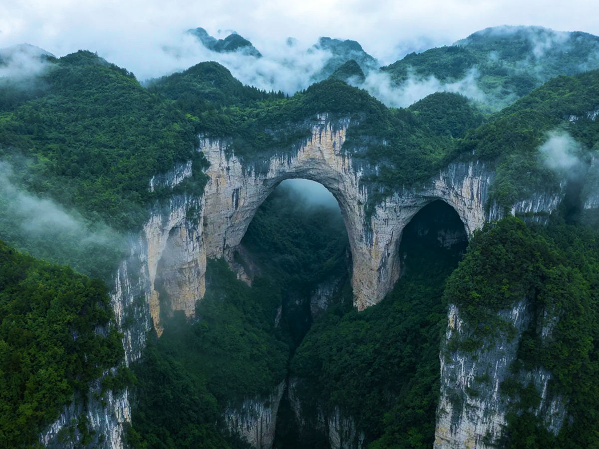 Natural arch of Wulong Three Natural Bridges above a deep gorge